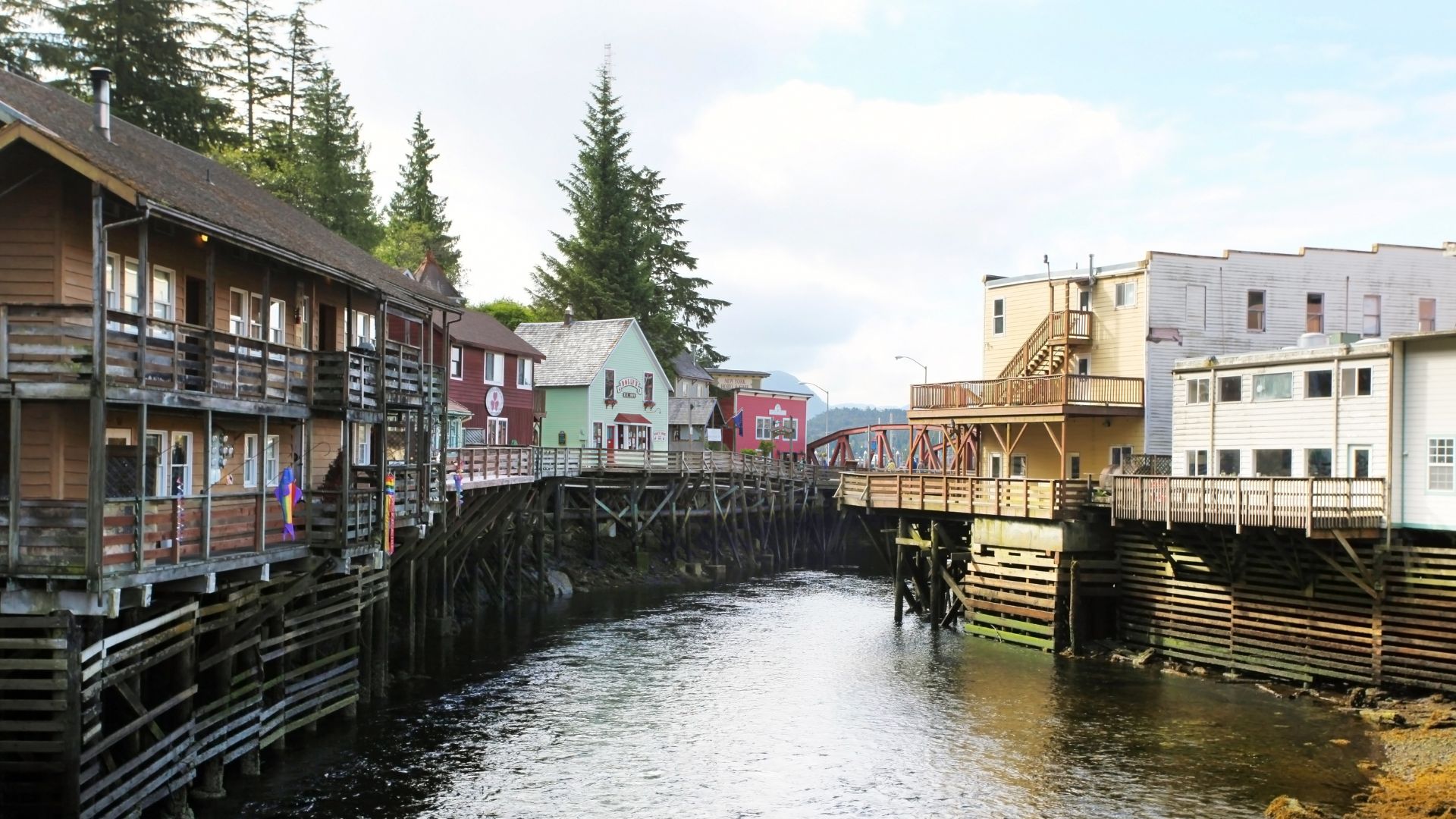 Ketchikan's Creek Street — the historic boardwalk on pilings over the creek, the closing-evening stop ashore before disembarkation.