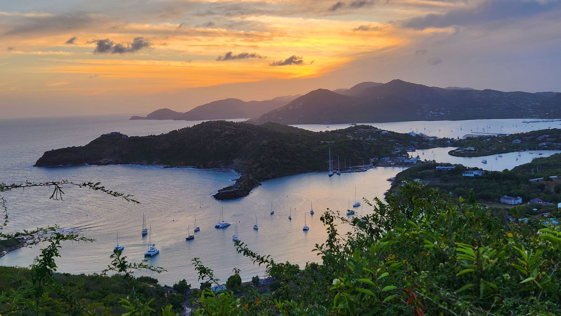 The view from Shirley Heights over English Harbour and the anchored fleet, Antigua.