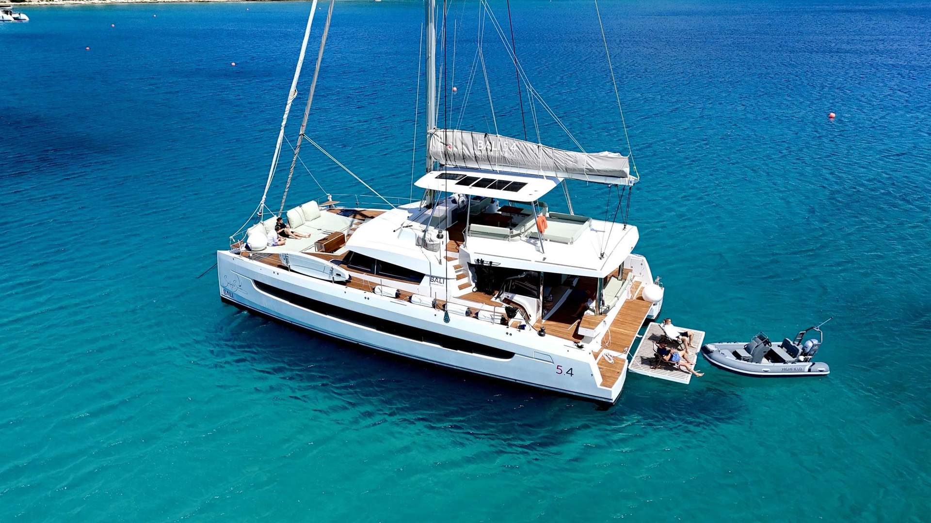 Cabrera Cova Blava sea-cave snorkel — yacht moored at Port de Cabrera.