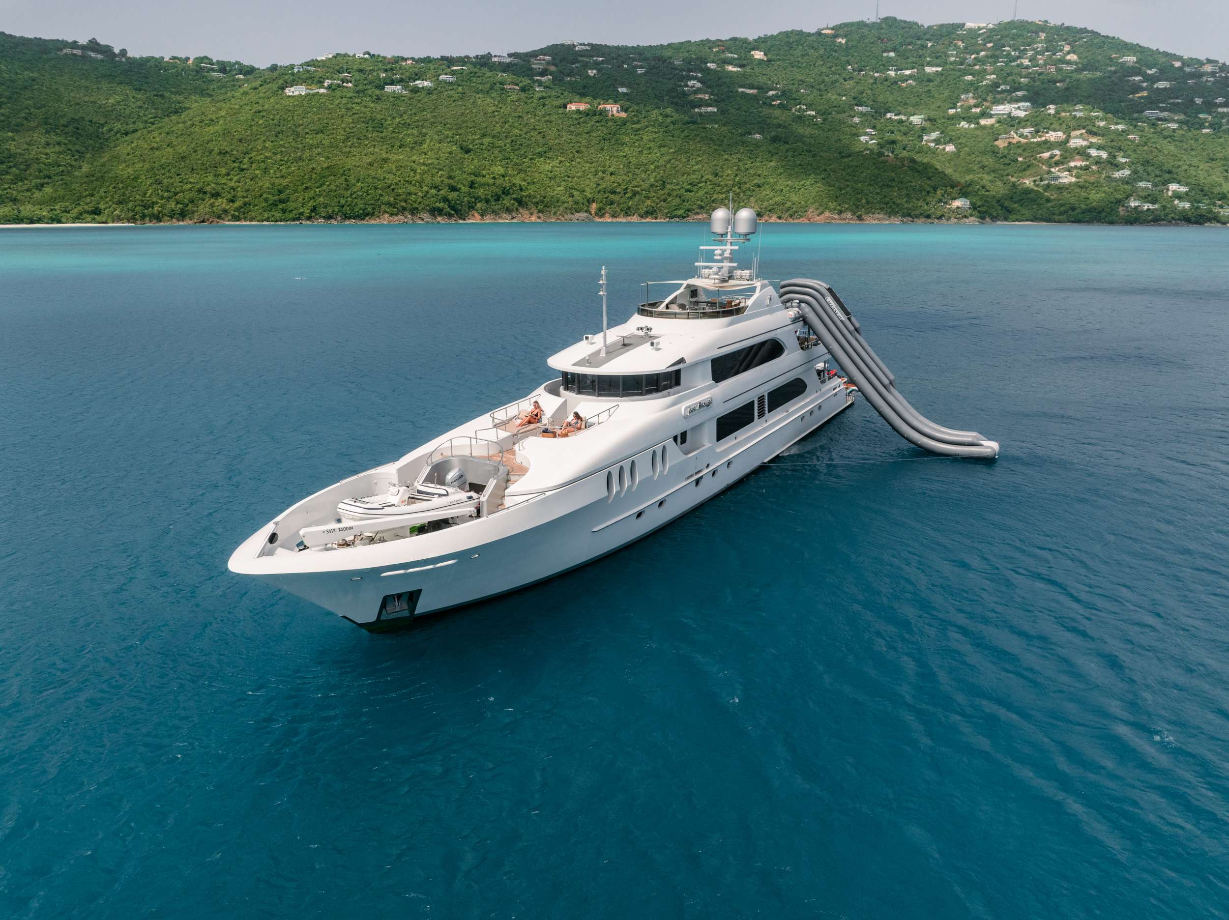 A crewed motor yacht at anchor in the Virgin Islands — this route works just as well under power as under sail.