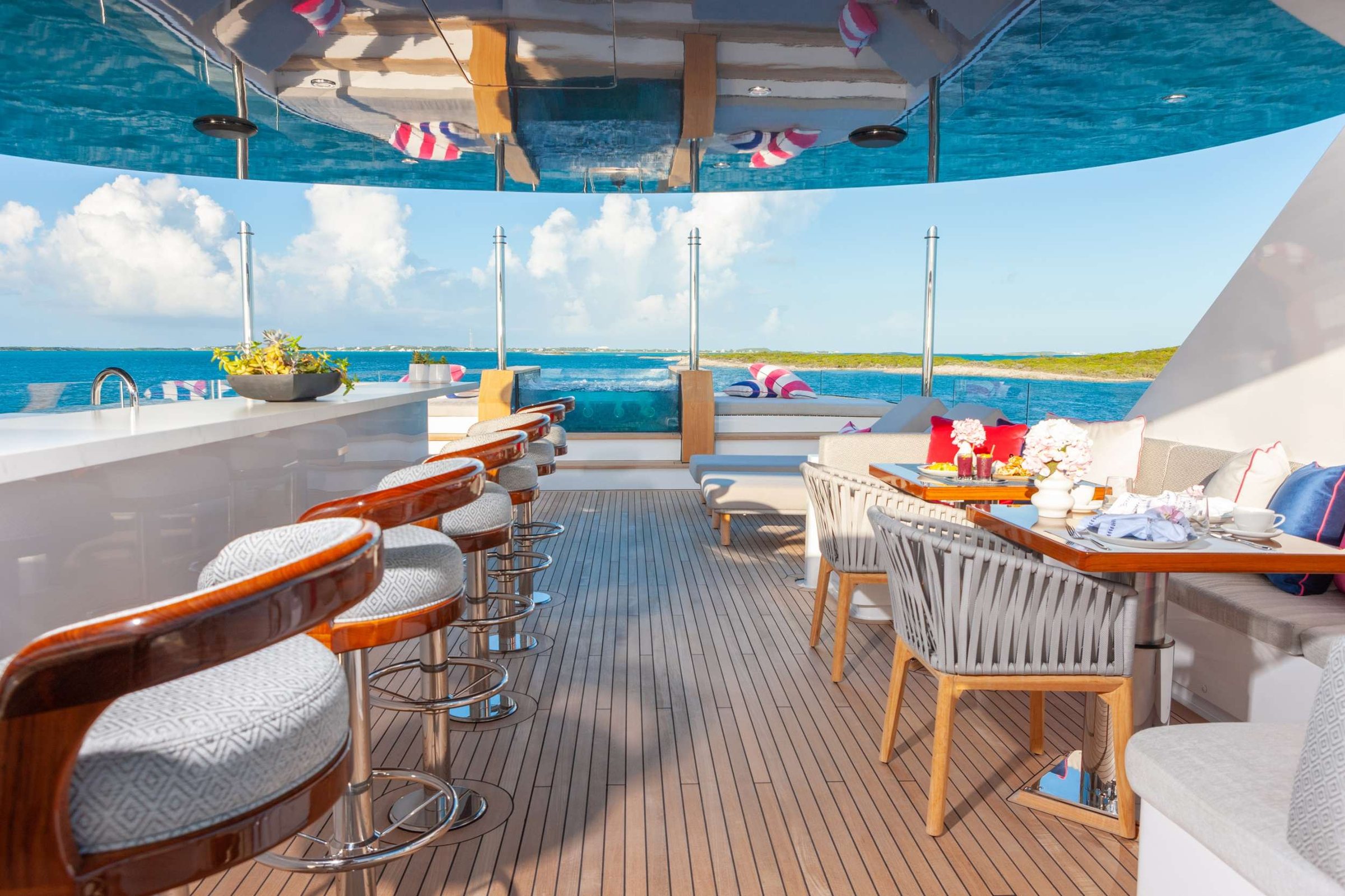 Back aboard for the first evening: the aft-deck bar, the hot tub, and the chef's first dinner.