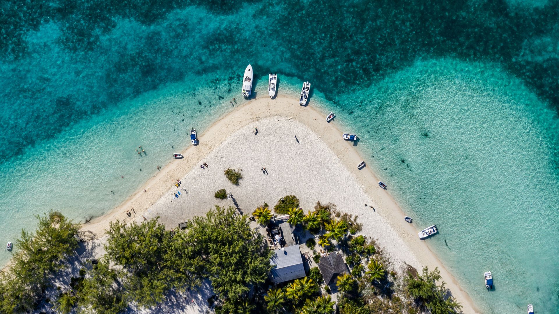 Chat n Chill on the point at the harbor entrance — the headline beach bar of the southern Exumas.