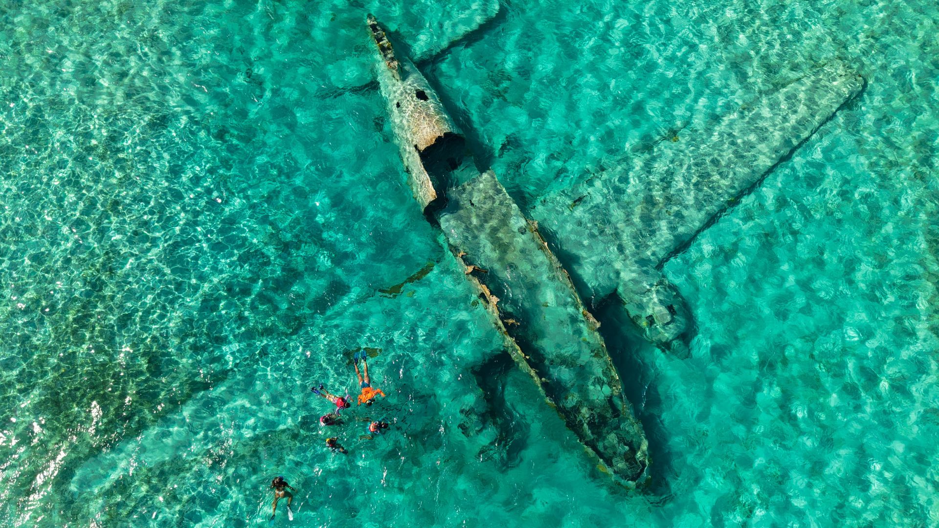Sunken plane wreck off Norman's Cay, Exuma Bahamas