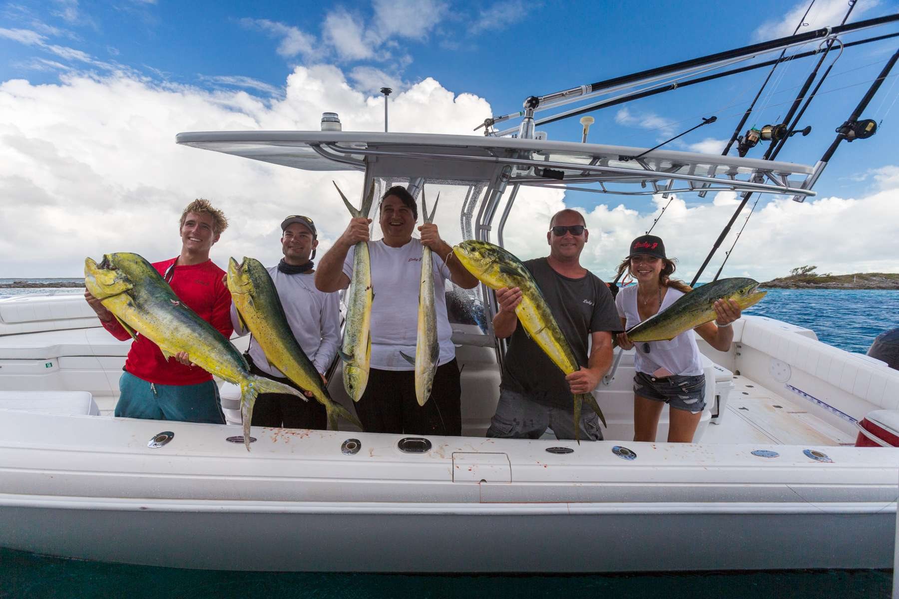 The yacht's tender doubles as a sportfishing boat — a morning's mahi off the deep side of Exuma Sound.