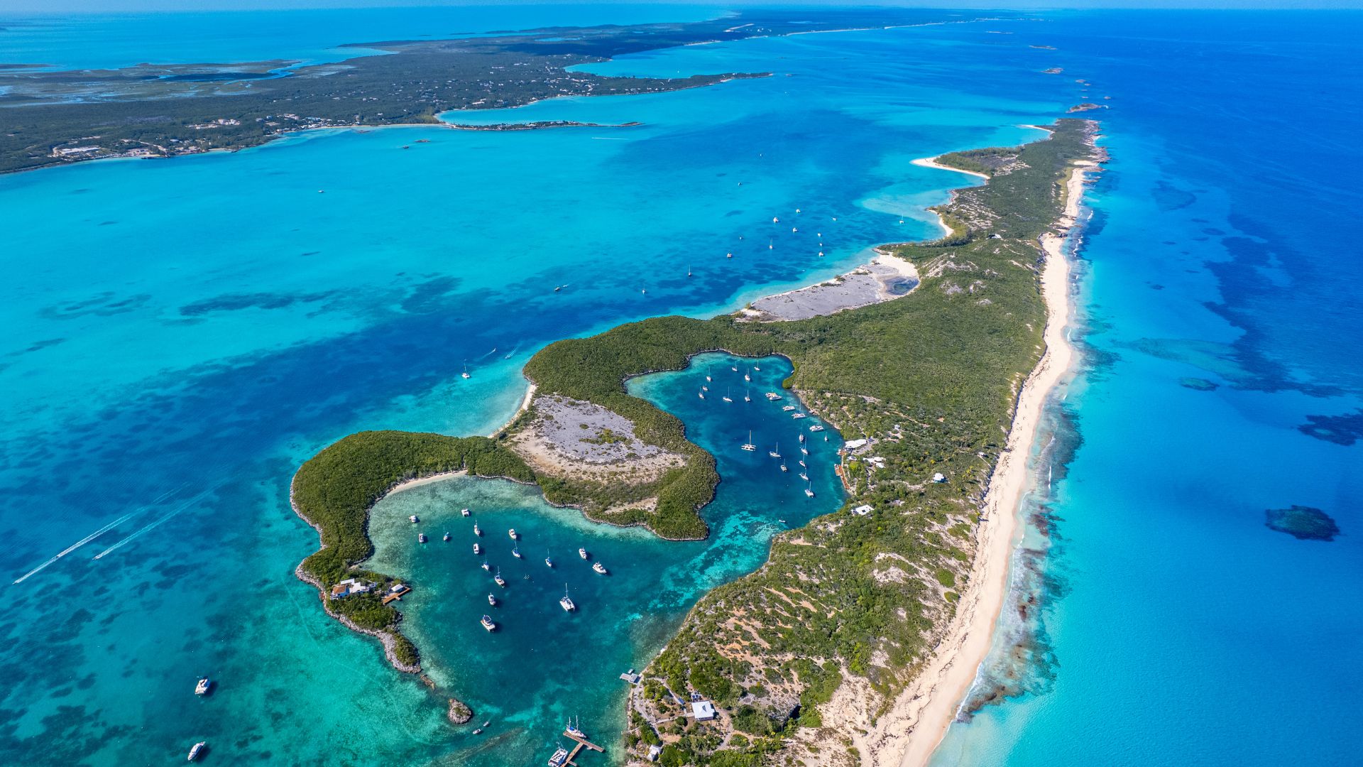 Aerial of Stocking Island and Elizabeth Harbour, the embarkation anchorage at the southern end of the chain.
