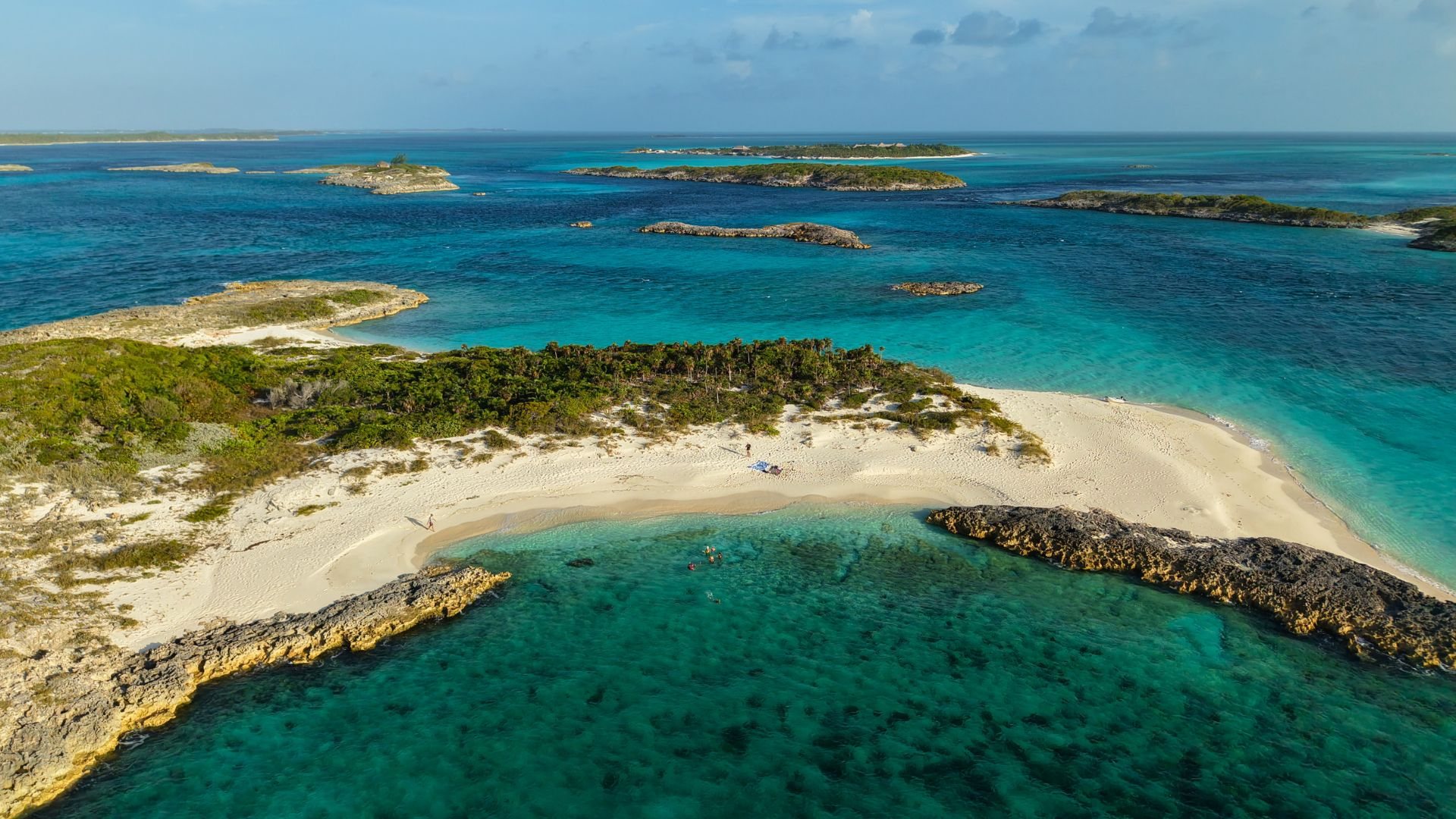 A beach and the small cays behind Warderick Wells in the Exuma Cays Land and Sea Park.