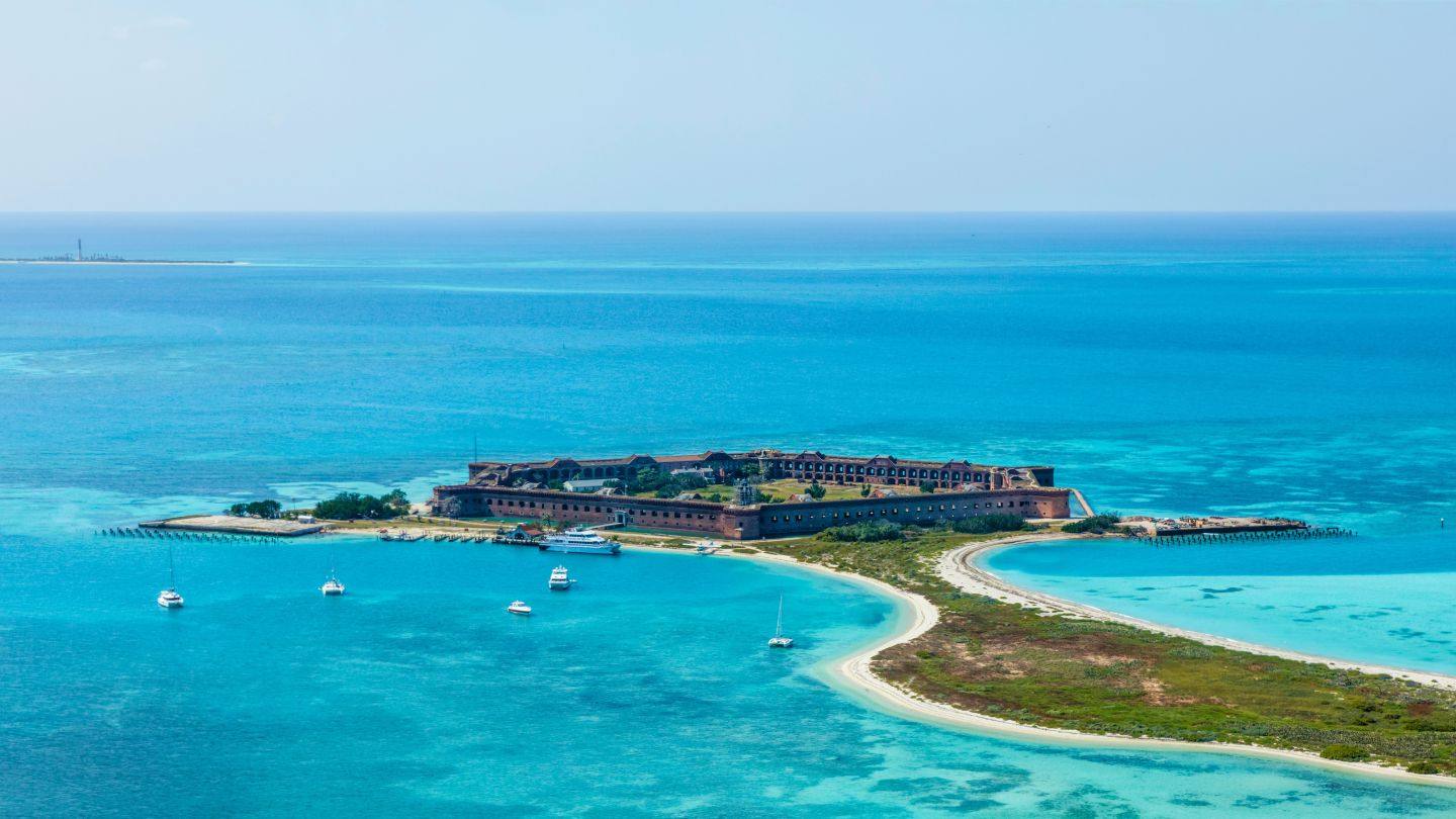 Fort Jefferson from the anchorage side, sailboats and small craft anchored inside the one-mile zone