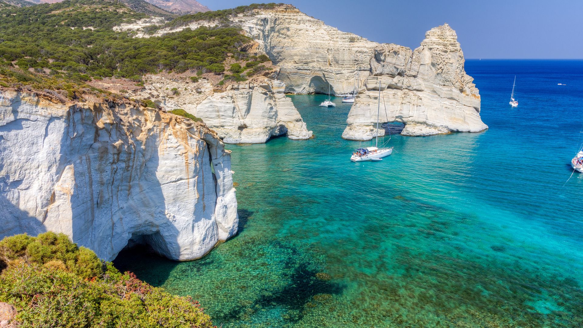 White volcanic sea-cave arches at Kleftiko Bay on Milos.