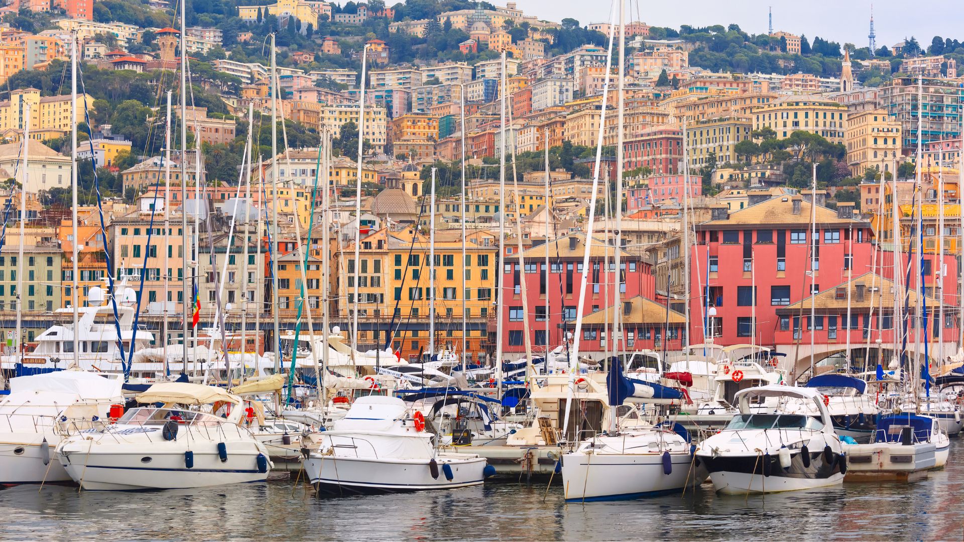 Crewed yacht stern-to in a harbor on the Italian Riviera