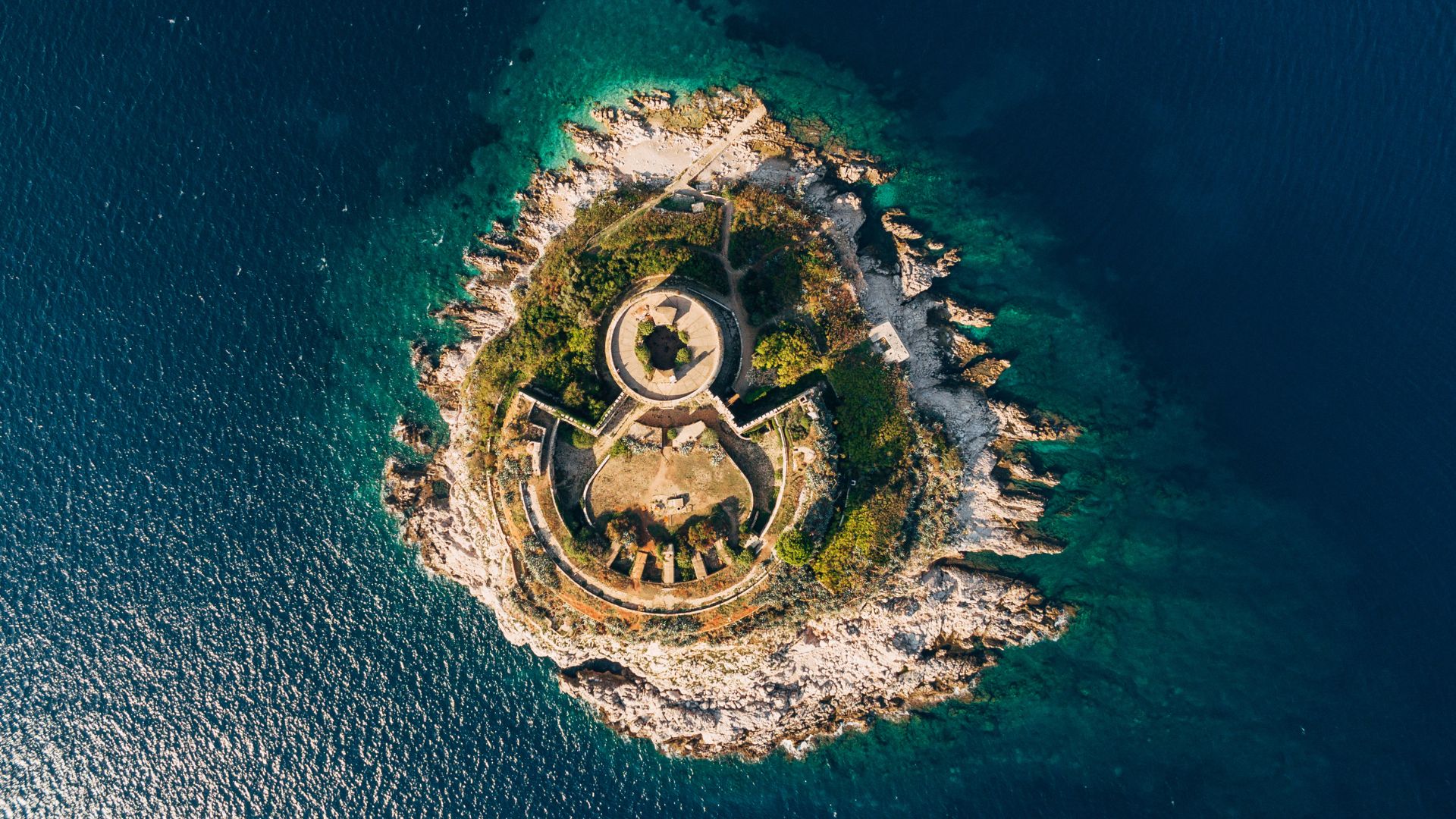 Mamula Island — built by the Austro-Hungarians in the 1850s, used as a Yugoslav internment camp during WWII, reopened in 2023 as a Marriott Autograph Collection wellness hotel.