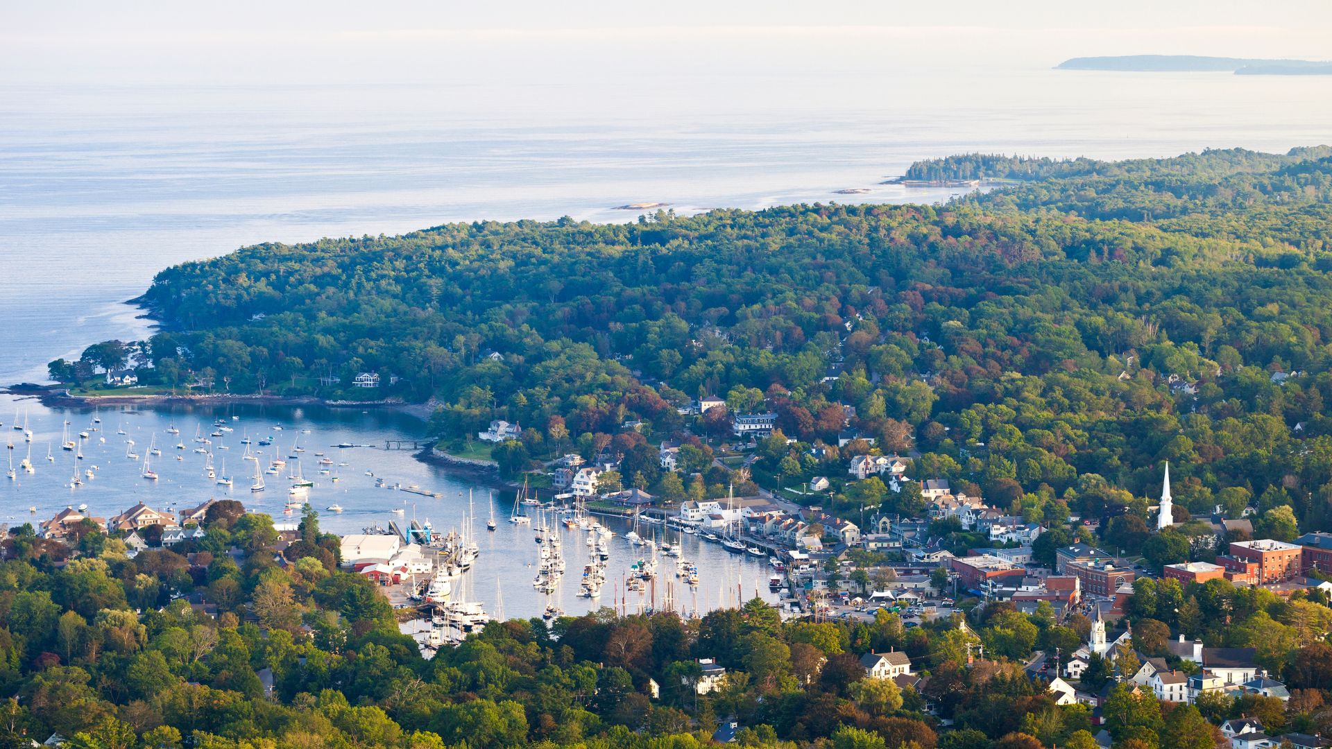 Camden Harbor and its schooner fleet from Mount Battie, Penobscot Bay beyond.