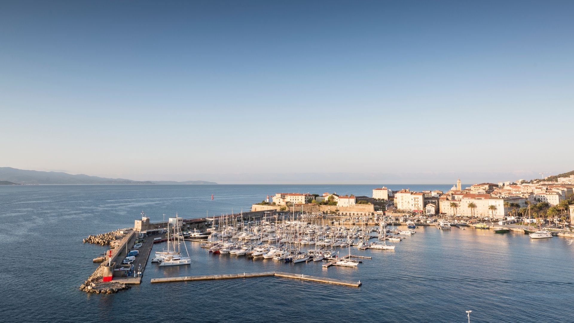 Marina d'Ajaccio sits at the head of the Gulf of Ajaccio — a ten-minute taxi from AJA airport and the embarkation point for the west-coast route.