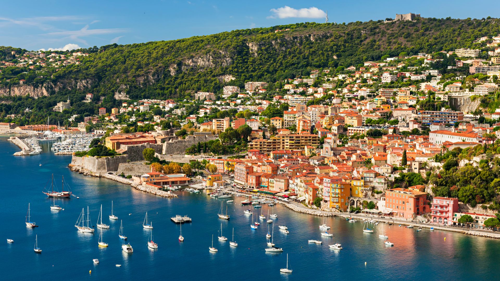 Villefranche Bay holds the deepest anchorage on the French Riviera — a horseshoe between Cap Ferrat and Mont Boron, deep enough for any size yacht and sheltered in any wind direction.