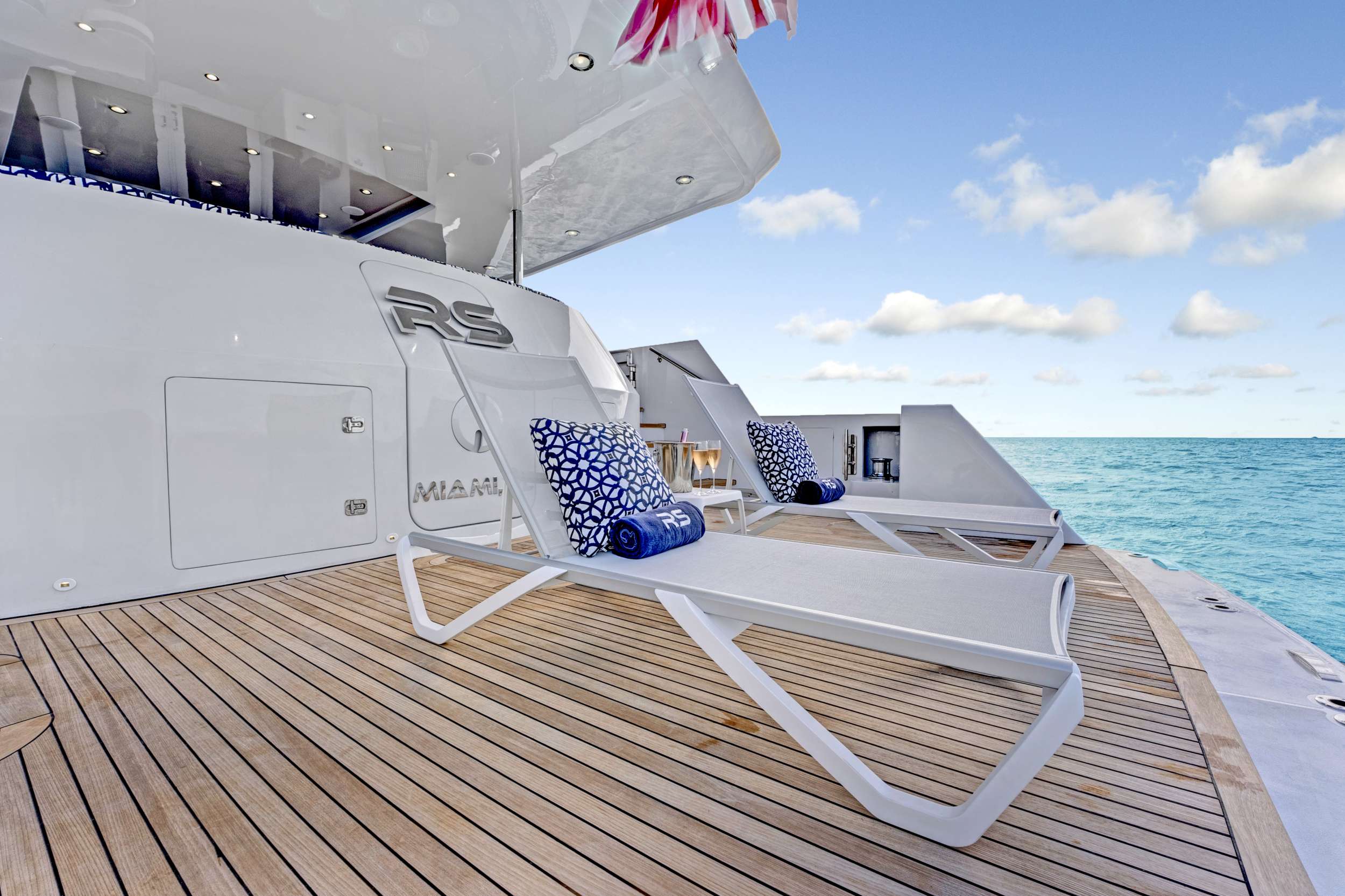 Sundeck loungers aboard a crewed motor yacht in the Caribbean Leewards