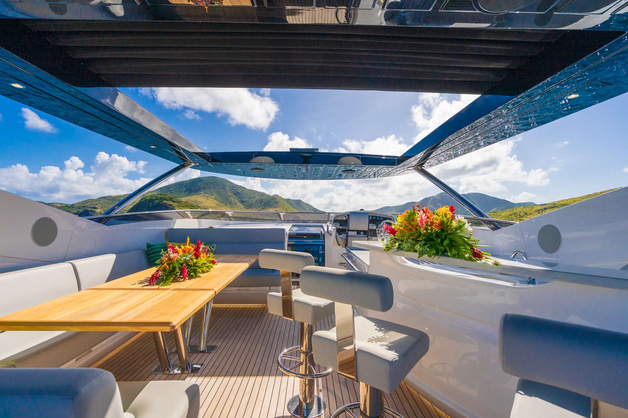 Al fresco dining aboard a crewed yacht in the Caribbean