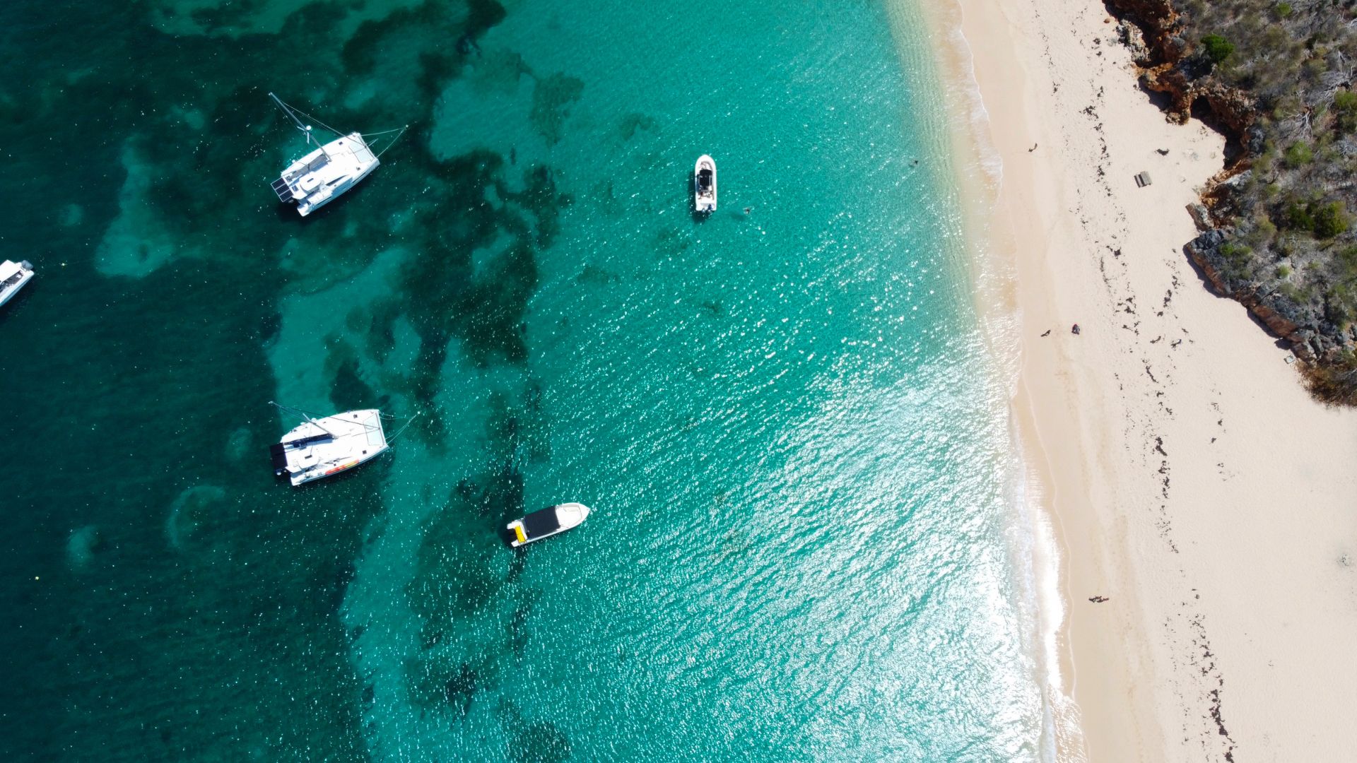 Muskmelon Bay's rugged coast and vibrant marine life make it a great spot for snorkeling and exploration.