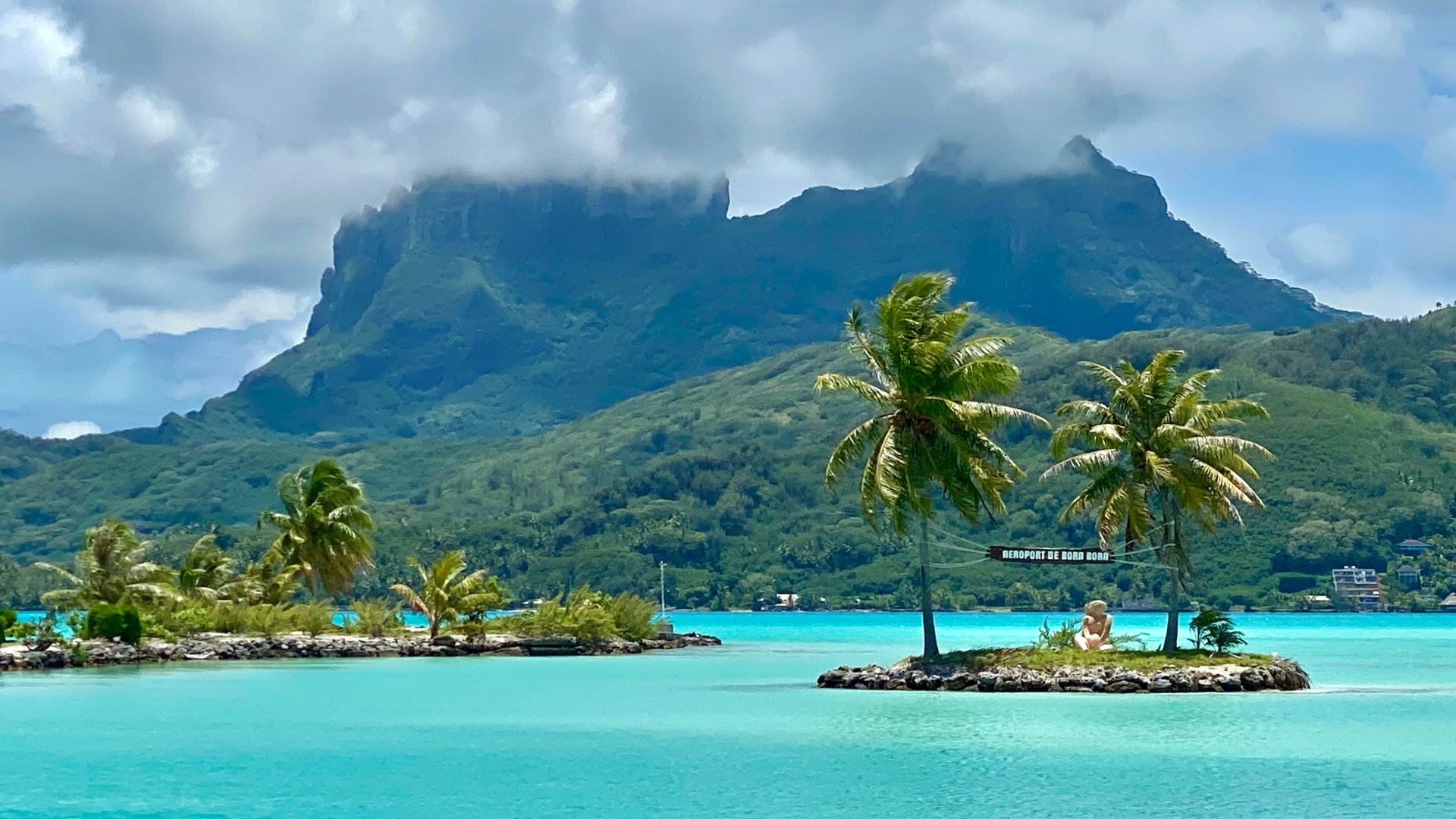 The unmistakable silhouette of Bora Bora and Mount Otemanu.