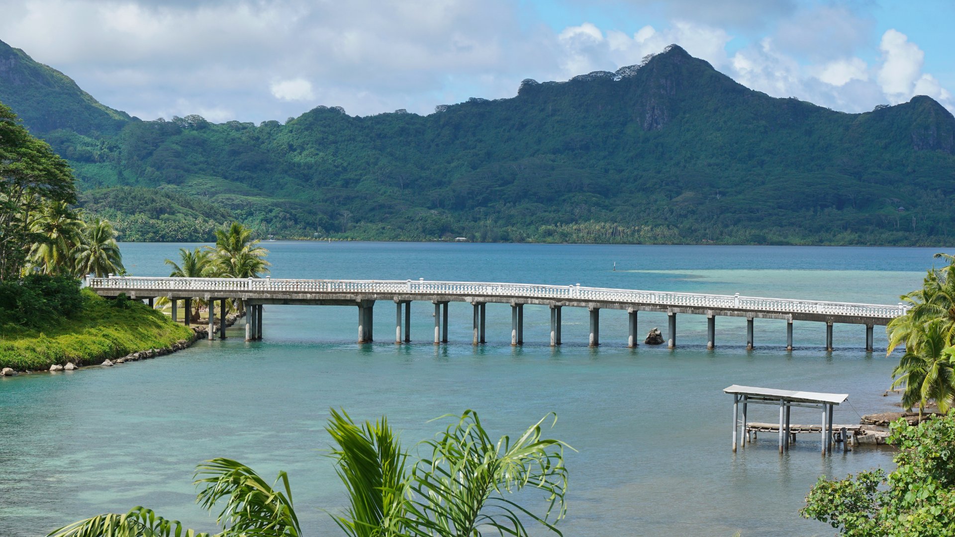 Huahine's lush green interior and protected lagoon.