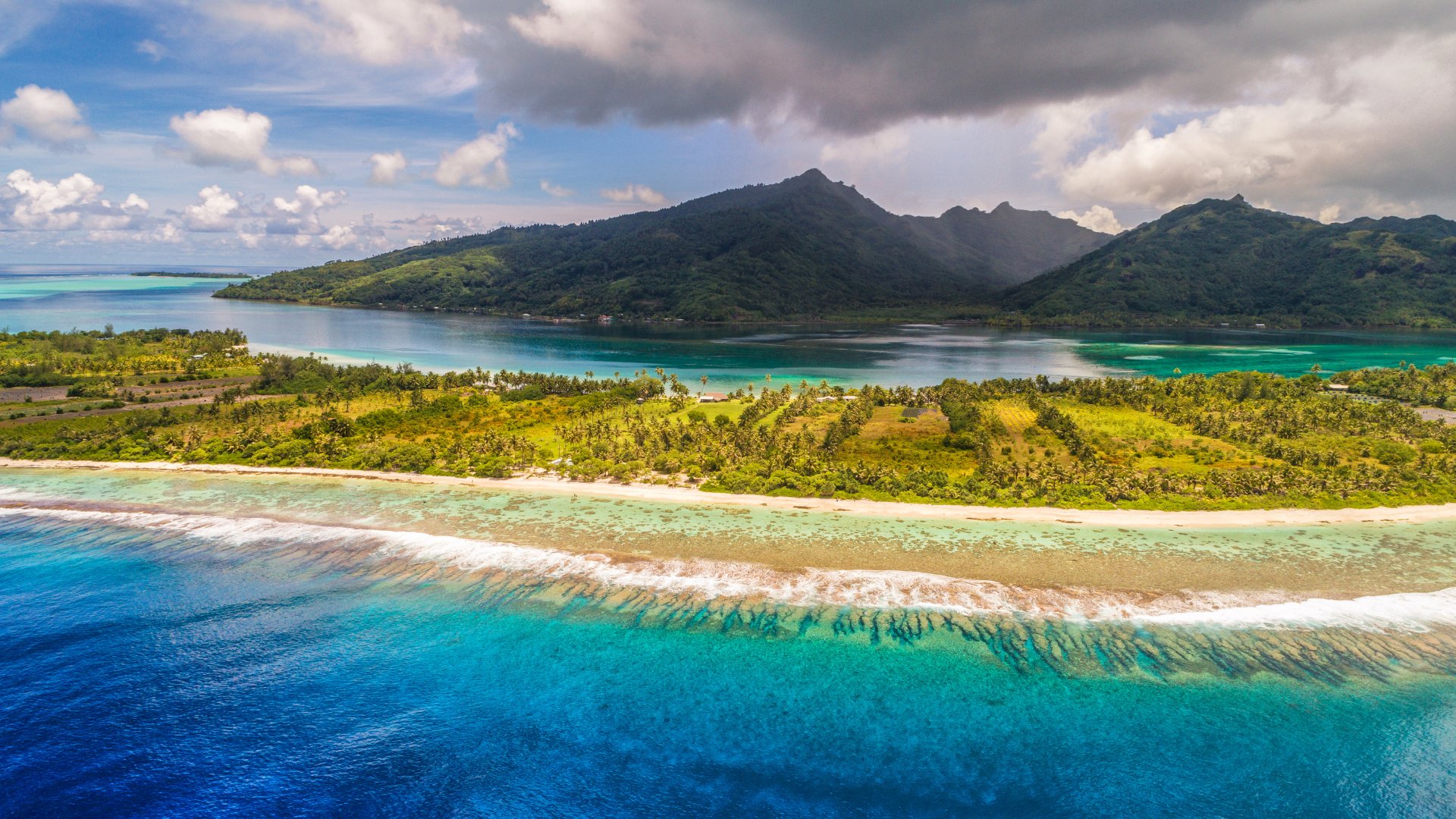 Aerial view of Huahine's outer motu, reached by an upwind sail from Raiatea.