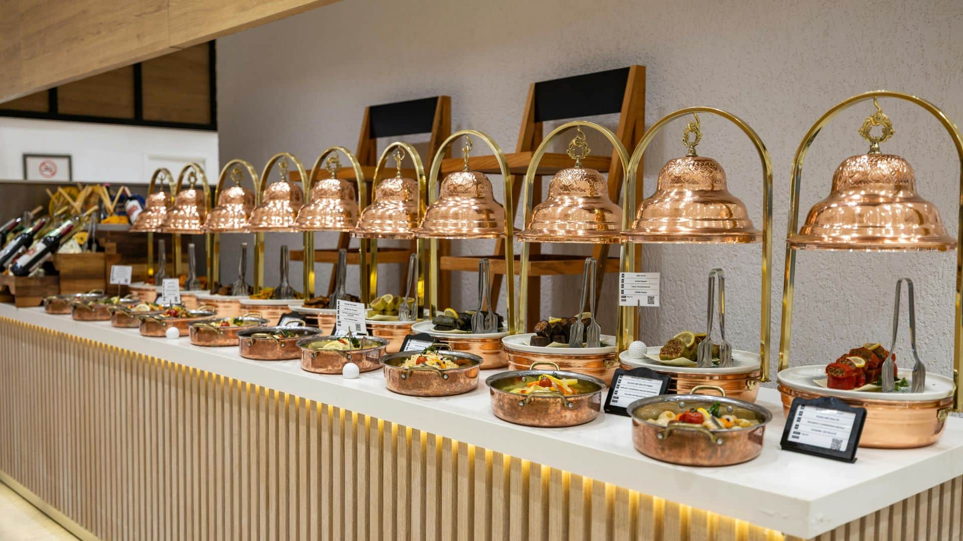 The Aegean Turkish food register — mezze in flat dishes, copper service, raki served with cold water. Datça's quayside meyhanes run this exact pattern, and the chef on board runs it when dinner is aboard.