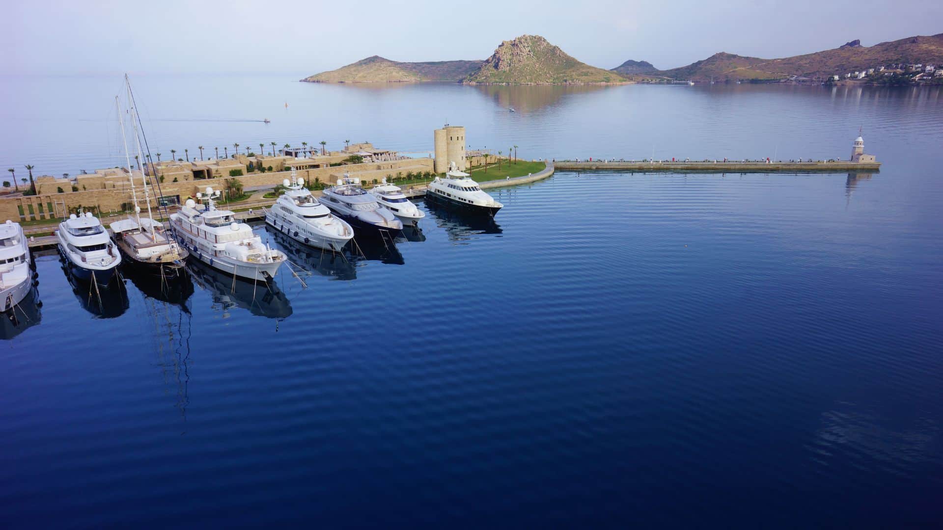 Yalıkavak Marina from above — Palmarina's superyacht quay at the western tip of the Bodrum peninsula.