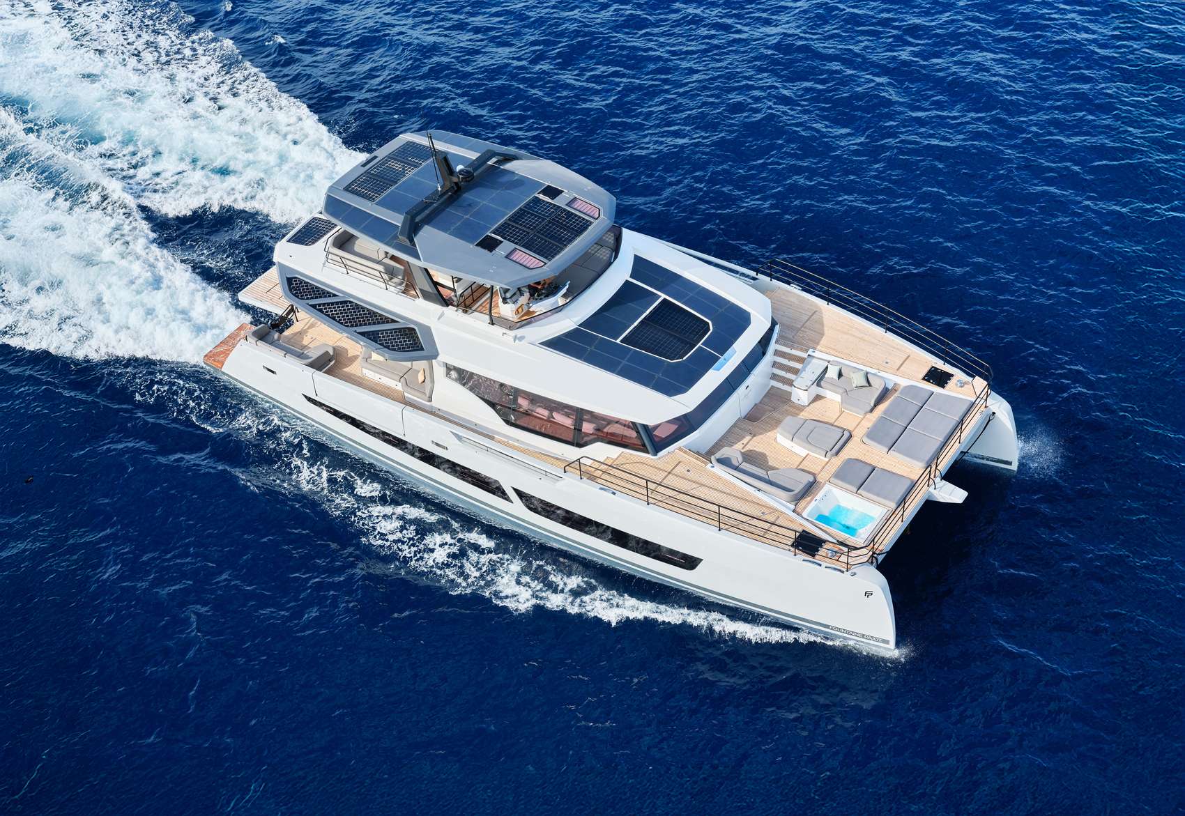 Power catamarans are a popular BVI choice — wide decks, shade, and a steady, easy ride between anchorages.